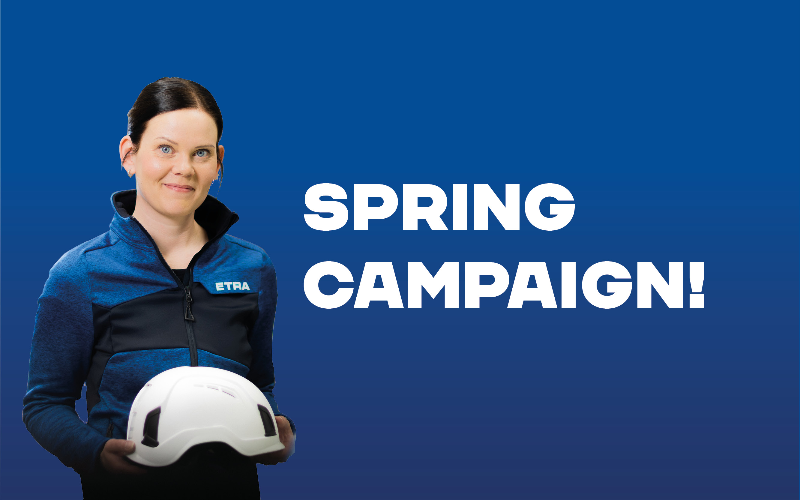 Promotional image featuring a woman smiling against a blue background, holding a white safety helmet. She is wearing a blue and black jacket with the Etra logo.