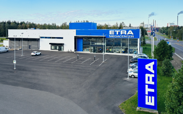 Etra's store with a spacious yard area, featuring a blue and white ETRA sign in the foreground.